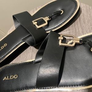 Black and silver Aldo Women’s Flip Flops